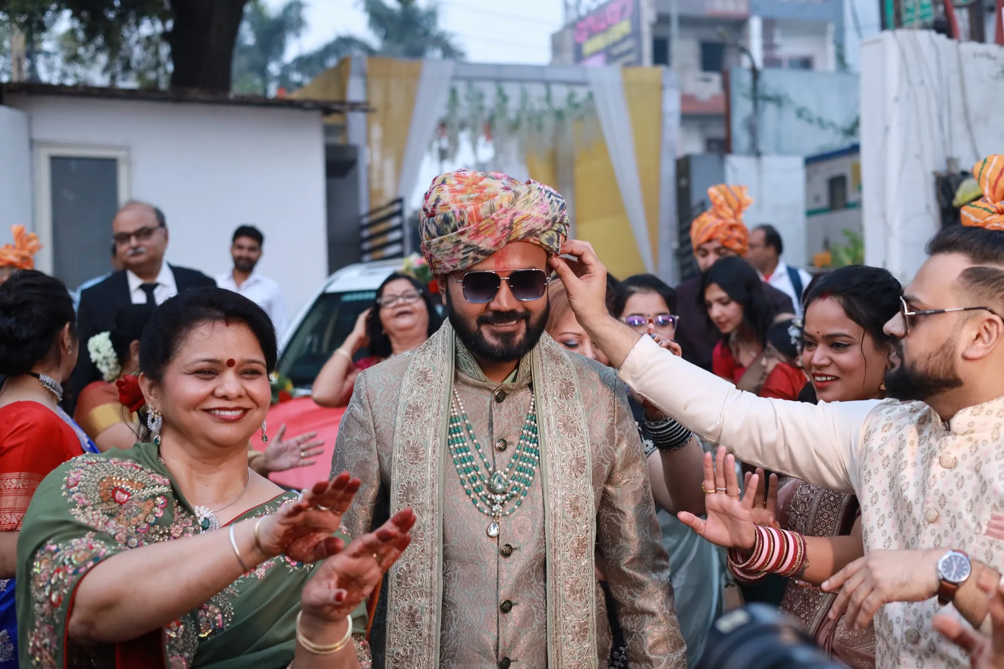 Groom arriving at his baraat with family